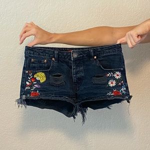 Black jean embroidered shorts frayed